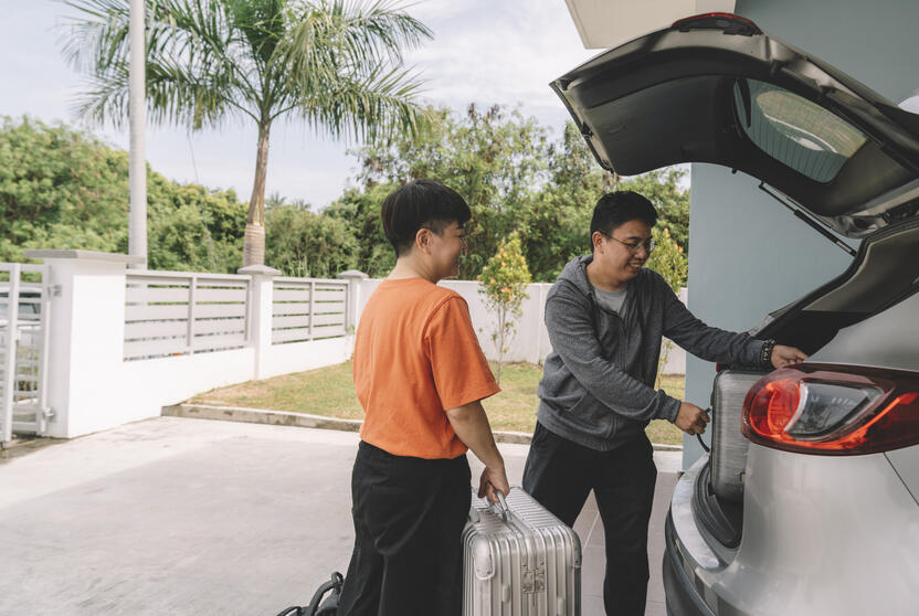 Driver carrying luggage